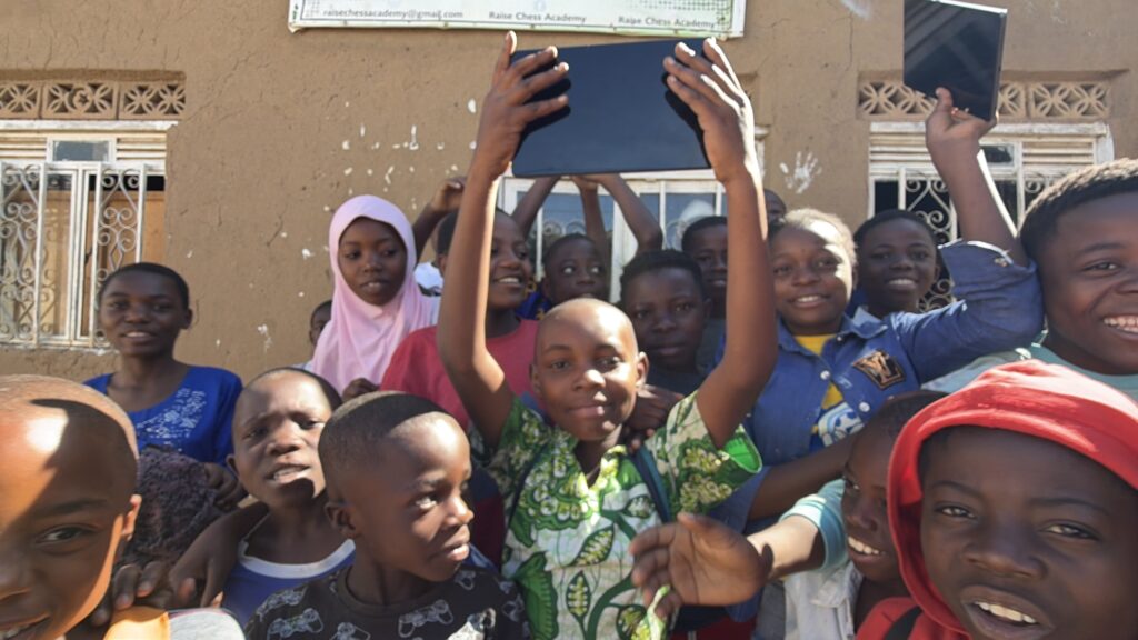 Students holding the tablets, ready to learn