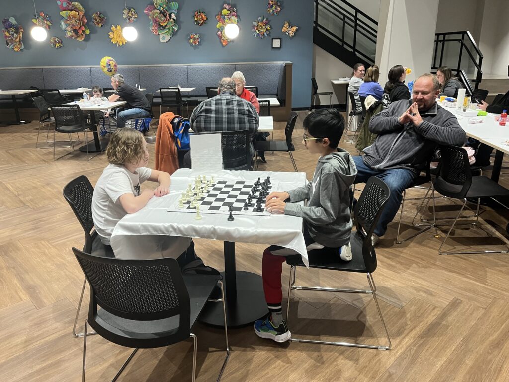 Kids playing chess at RMH